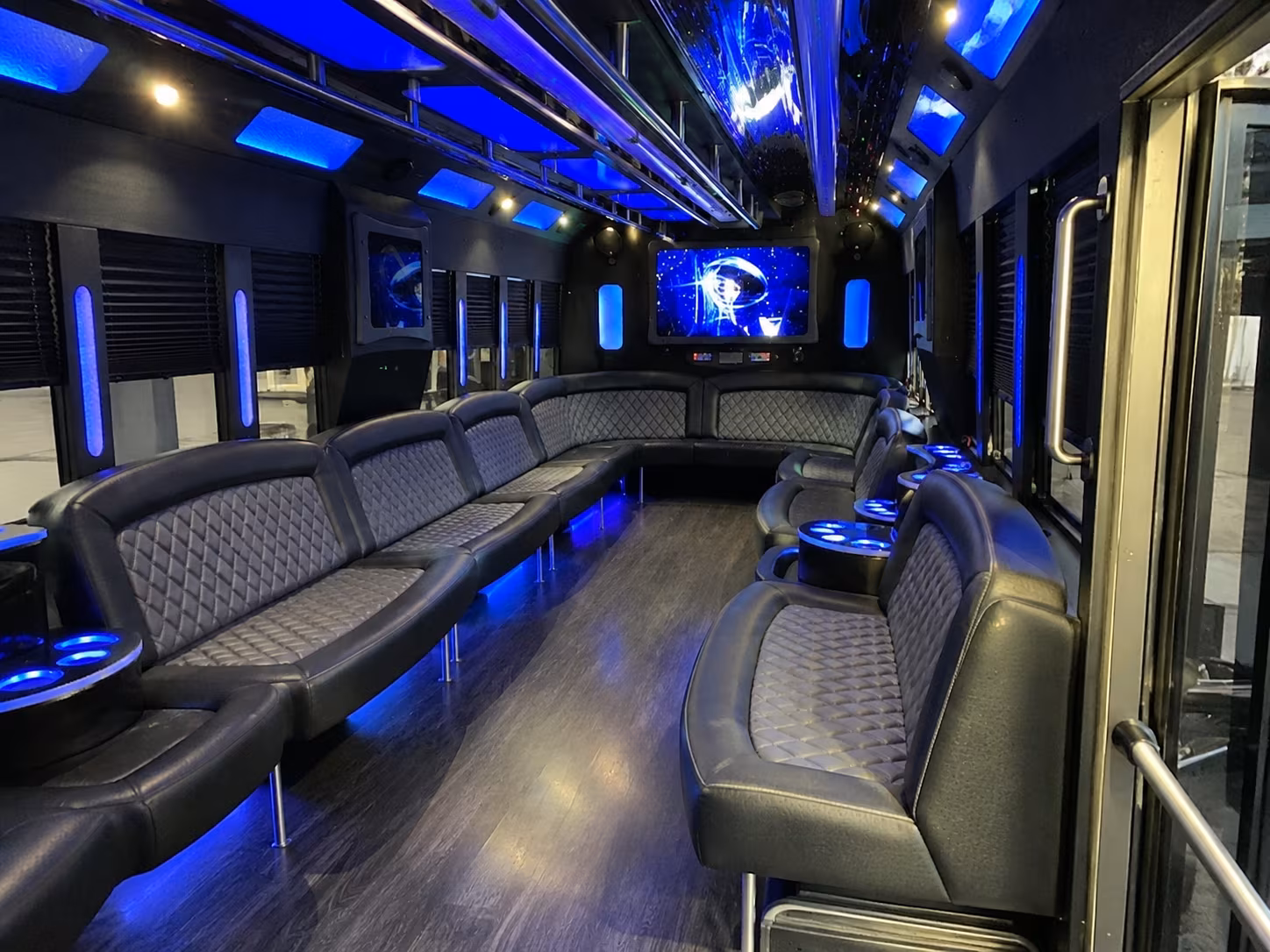 Wedding guests seated inside a party bus serving Mesa